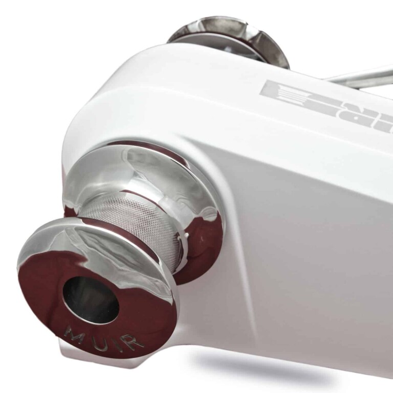 Precision industrial motor with sleek white design by Muir Engineering, perfect for manufacturing applications.