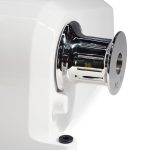 Precision mechanical component on white background.
